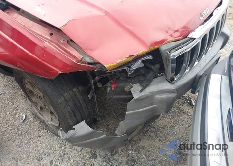 2002 Jeep Grand Cherokee Sport from USA, damaged, VIN 1J4GX38S52C154359